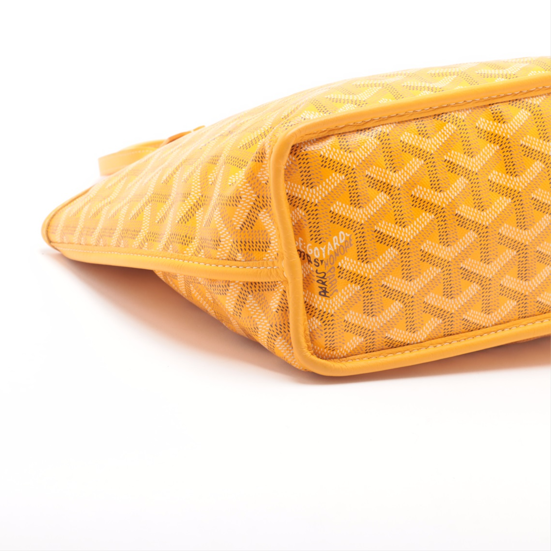 Yellow textured pouch on a white background