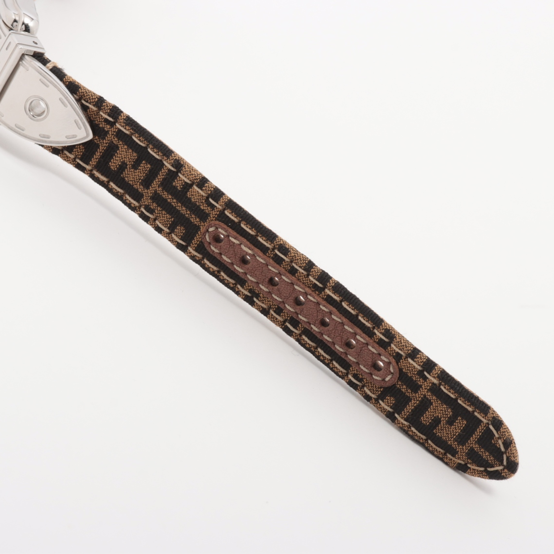 Close-up of a brown textured keychain strap on a white background