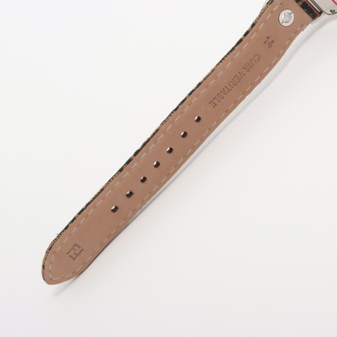 Brown watch strap with brand name on a white background